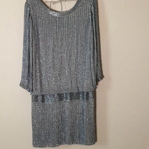 Plunging back flapper style evening dress